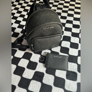 michael kors black monogram backpack and wallet